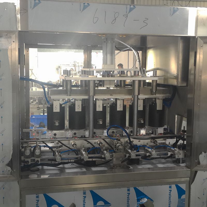 Embalagem de plástico Máquina de fecho automático de vácuo de alta velocidade para frascos de vidro de 6 cabeças