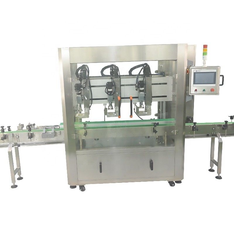 Máquina de fecho automático de 3 cabeças de alto desempenho para garrafas de plástico de capacidade 4000BPH
